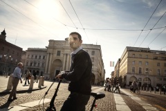 Europe, Italy, Emilia- Romagna, Parma. Federico Pizzarotti, the first 5-Star Mayor  to be elected in a large Municipality like Parma is seen on his bicycle while crossing the street of Gribaldi Square, the city center of Parma. MoVimento 5 Stelle is a political party in Italy launched by Beppe Grillo. 

for a story by Elisabetta Povoledo on the "5 Star movement, one year later" Parma, Emilia, Italy.

©Marco Gualazzini for the International Herald Tribune